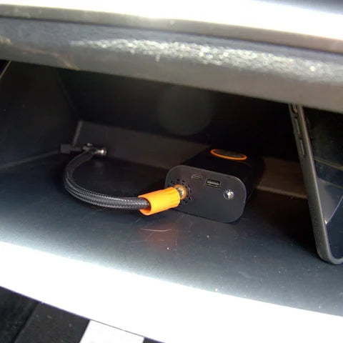GloveBox Air Pro stored in a car glovebox